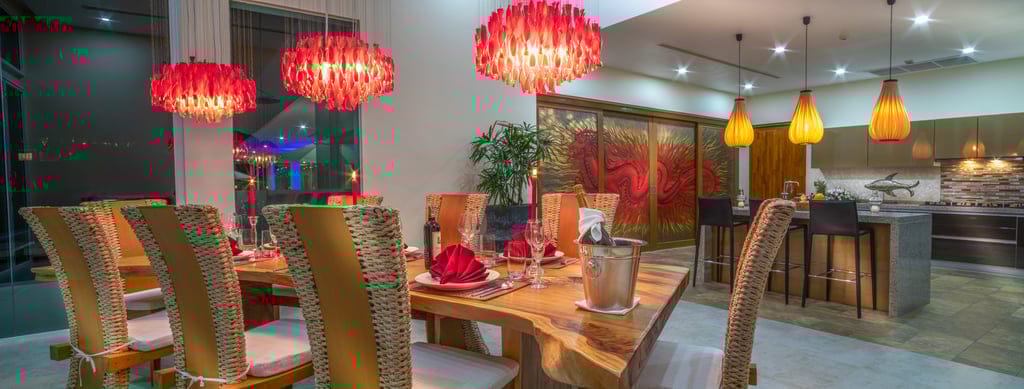 villa solaris dining room and kitchen in the evening