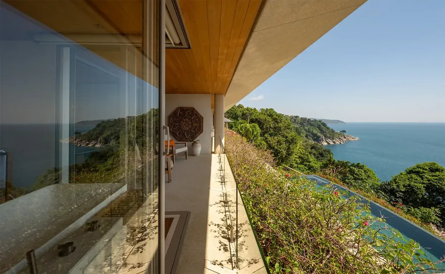 Bedroom 4 balcony above the pool and coastline