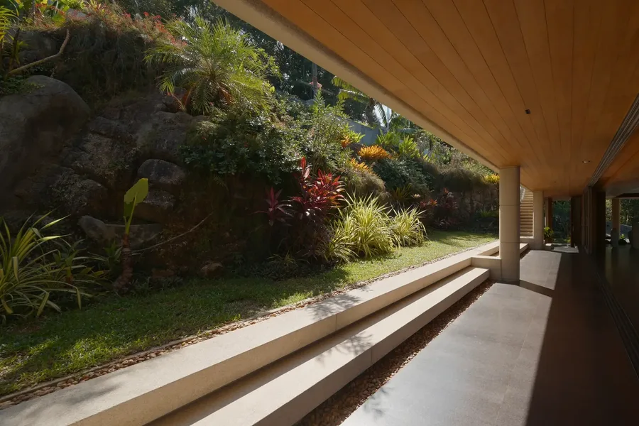Garden walkway beside the rocks and planting