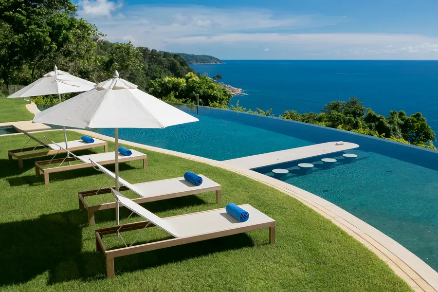 Loungers on the lawn above the coastline