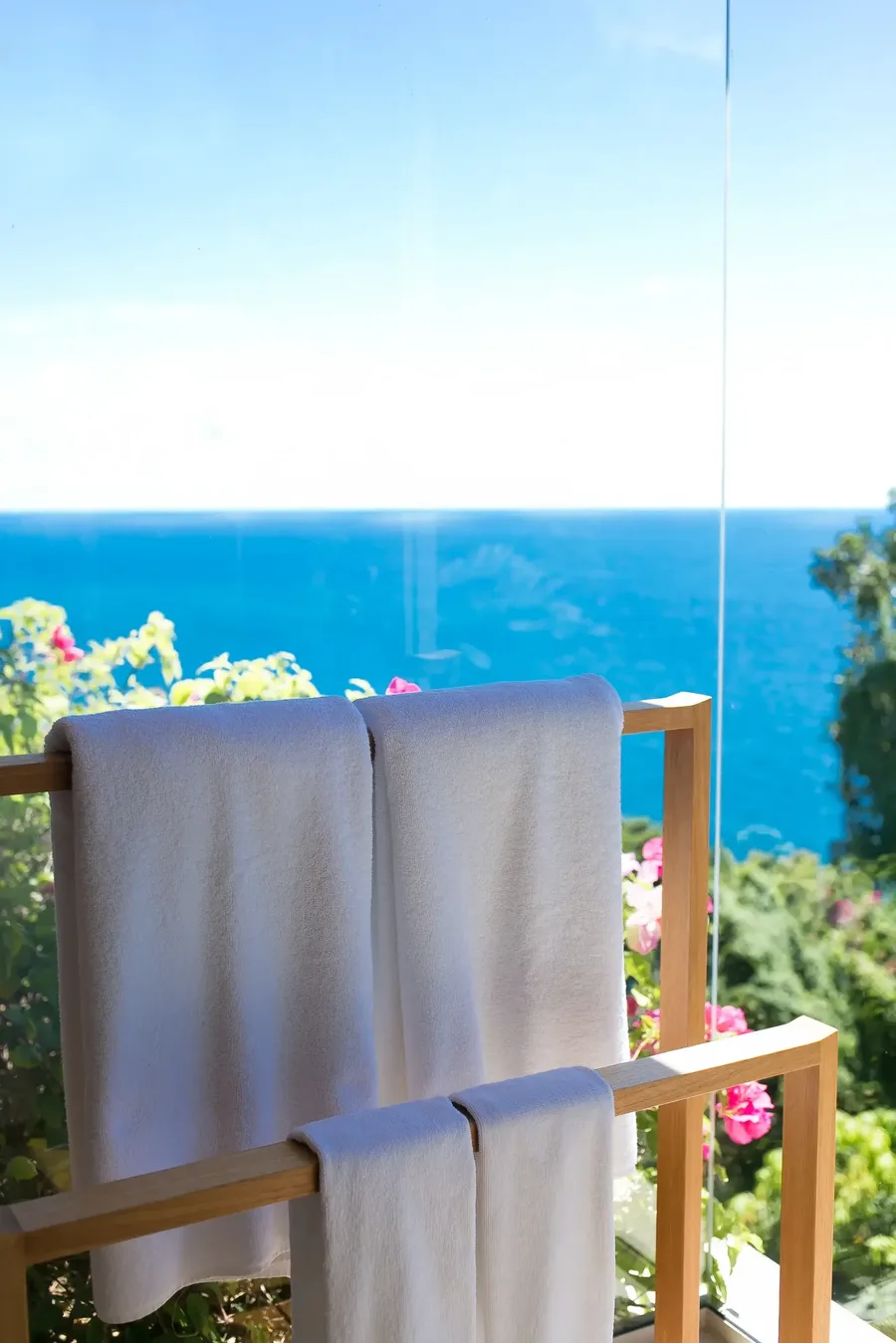 Towels on the master bathroom deck above the sea