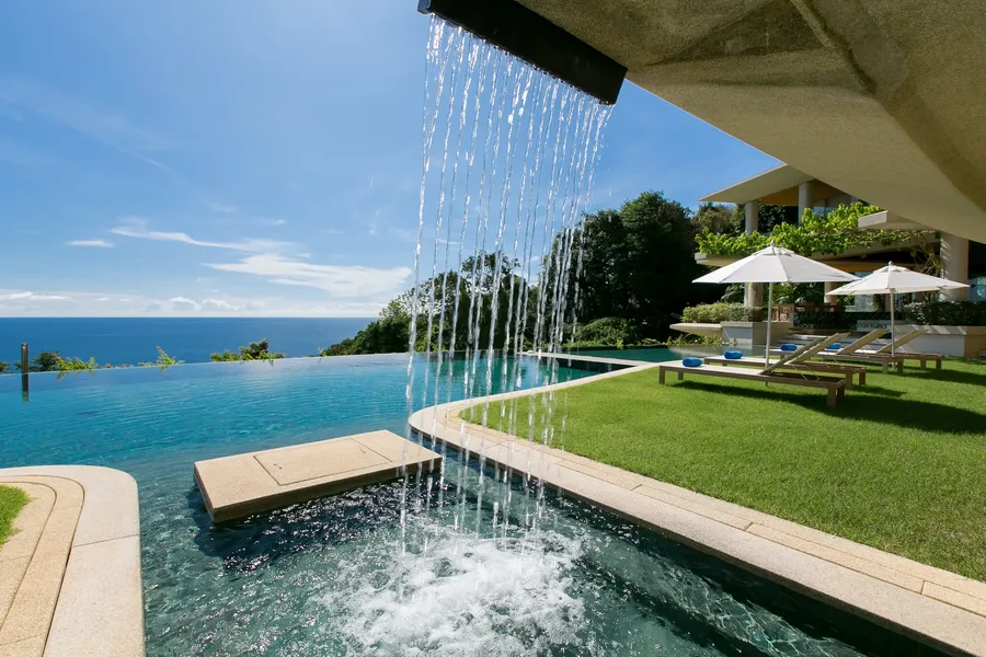 Water feature pouring into the infinity pool