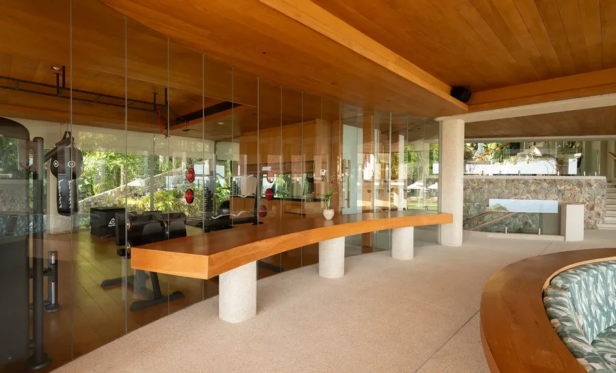 Sala lounge beside the glass-walled gym