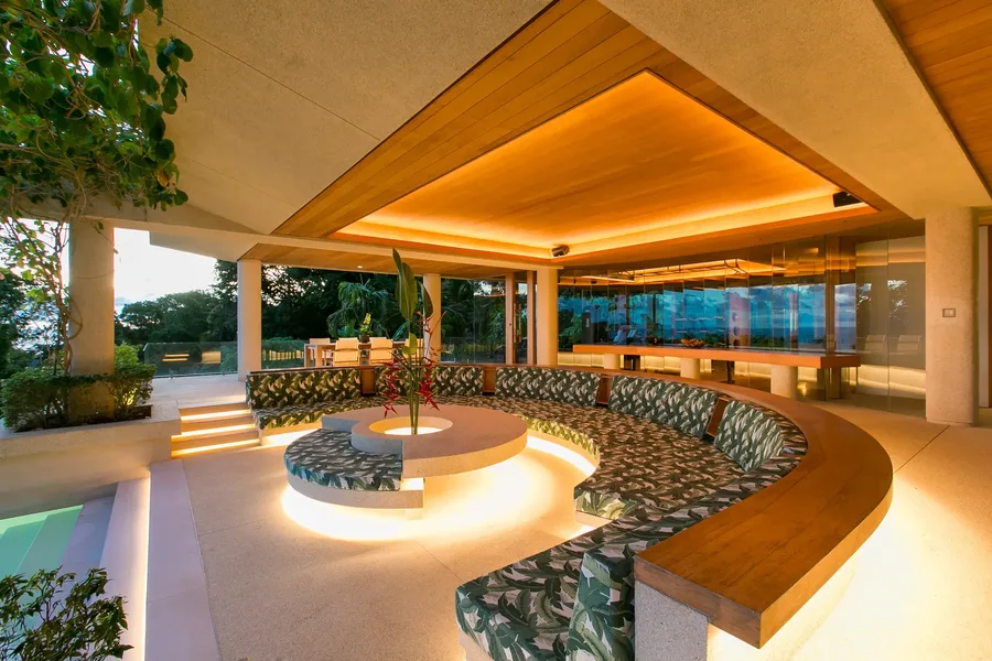 Sunken sala lounge lit in the evening
