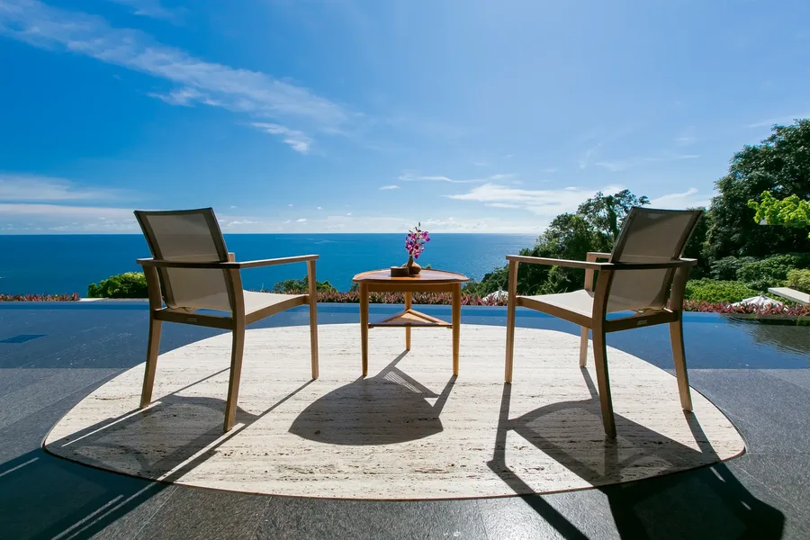 Terrace chairs beside the infinity pool